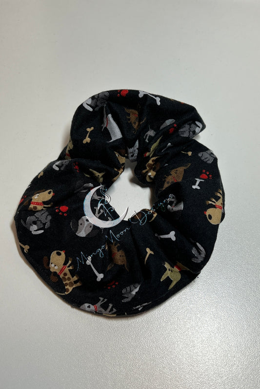 black fabric with puppies and bones scrunchie