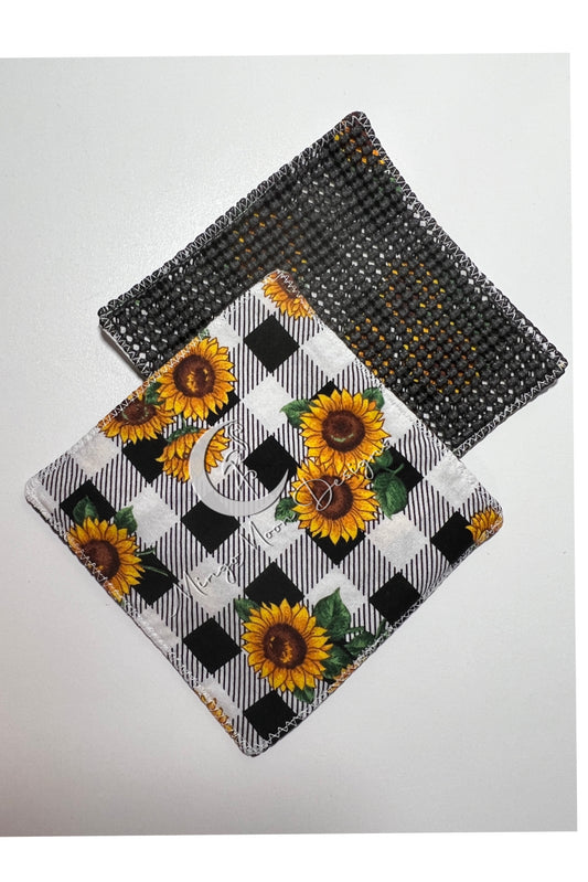 Black and white checkered with sunflowers and a slip grip backing jar opener