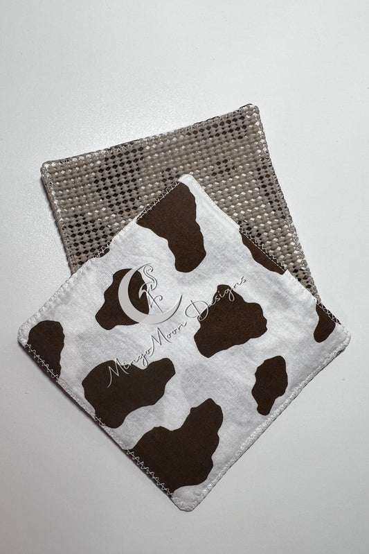 Brown and white cow print with a slip grip back jar opener