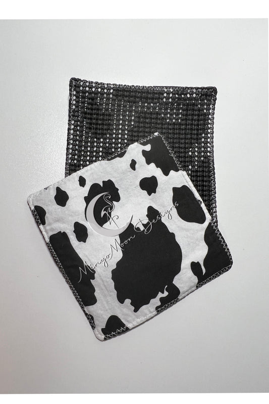 Black and white cow print with a slip grip back jar opener